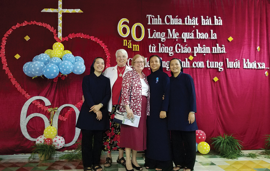 BVMs Teri Hadro (second from l.) and Kate Hendel (center) celebrate the 60th anniversary of the IHM congregation in Nha Trang, Vietnam, on Sept. 17, 2018.