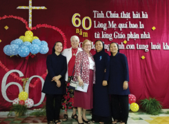 BVMs Teri Hadro (second from l.) and Kate Hendel (center) celebrate the 60th anniversary of the IHM congregation in Nha Trang, Vietnam, on Sept. 17, 2018.