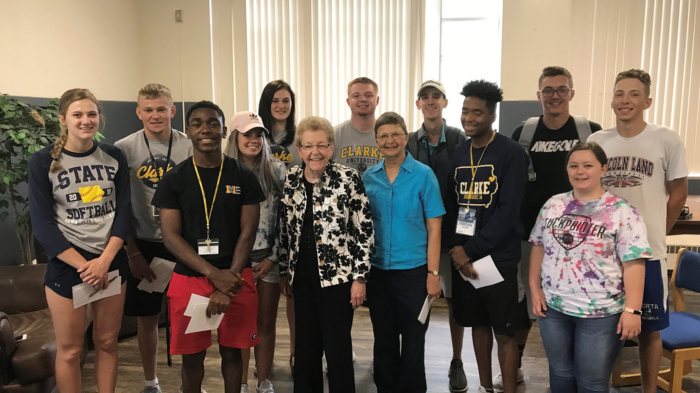 BVMs Catherine (Michele) Dunn and Paulette Skiba talk to Clarke University students on the shared value of charity.